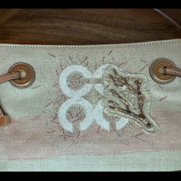 COACH Like New Audrey Jewel Beaded Metallic Coral Wristlet - Picture 1 of 5